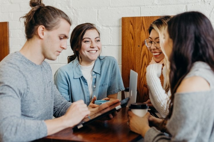 Four people organizing a fundraiser