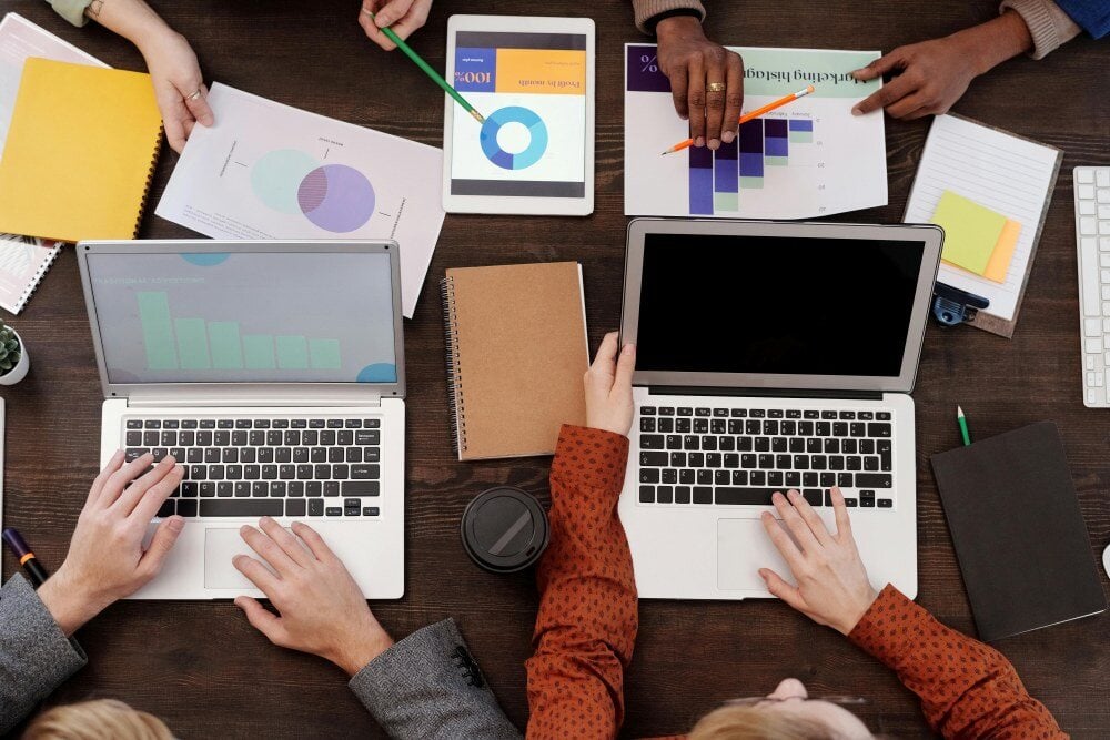 People working together on laptops