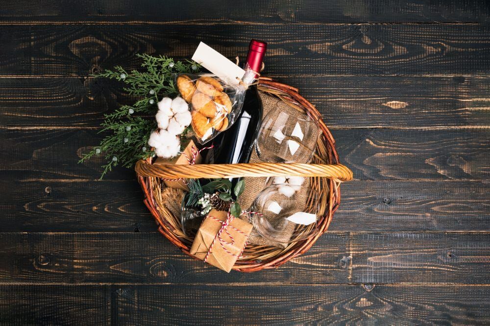 Silent auction hamper in a basket with wine and other items