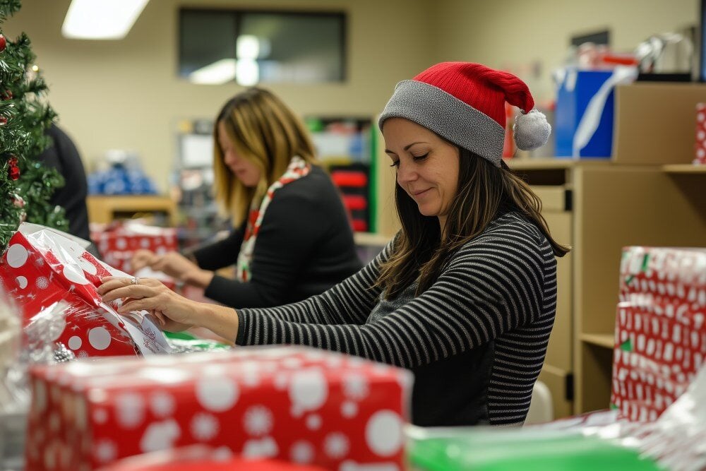 Volunteers wrapping gifts for Christmas fundraiser